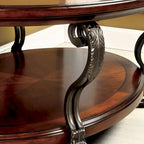Mesa de centro ovalada con superficie de cristal y estructura de metal con arabescos, color cerezo marrón, para 1 sala
